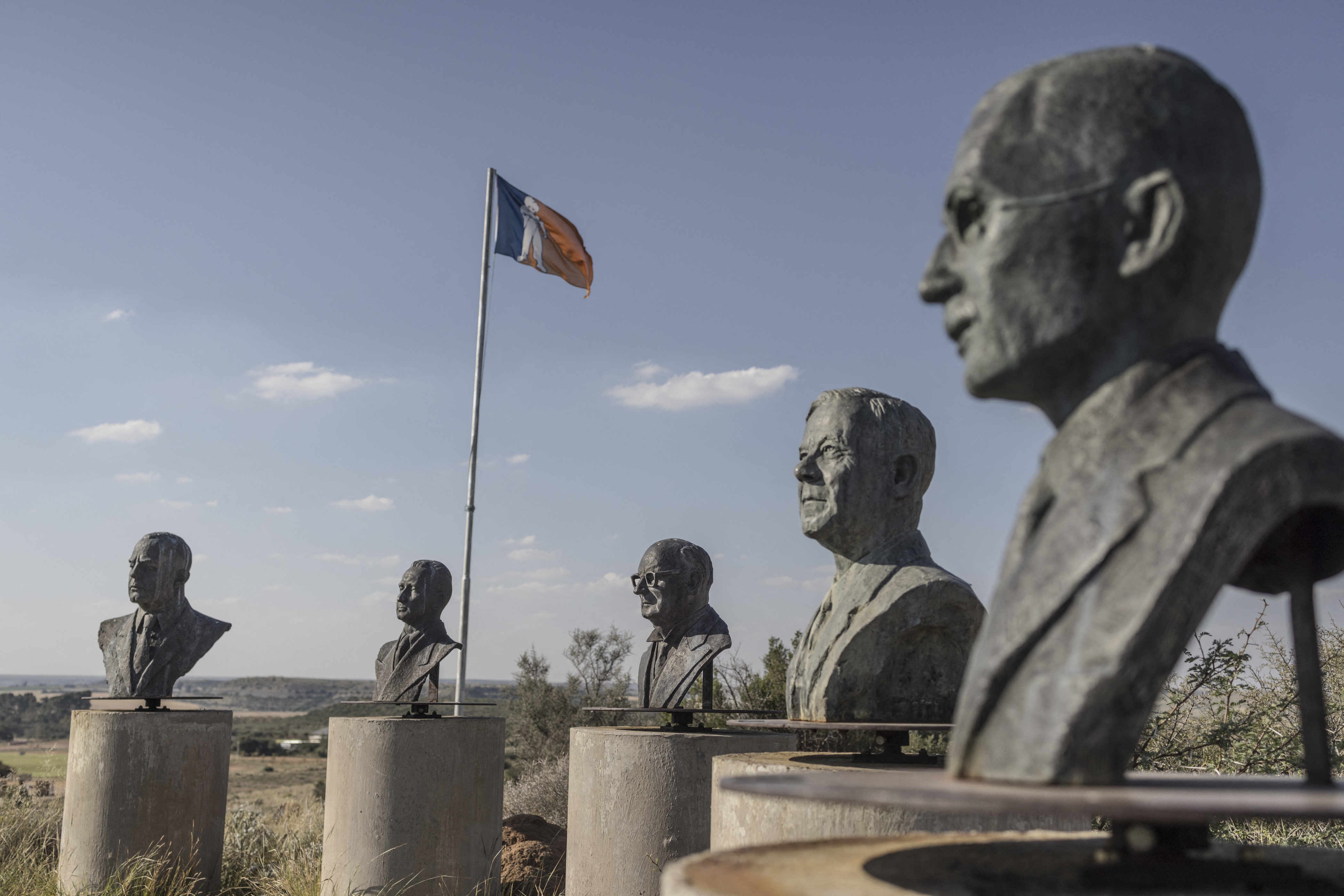 Bronze busts of past Afrikaner leaders are seen on a hill in Orania, South Africa, in 2024.